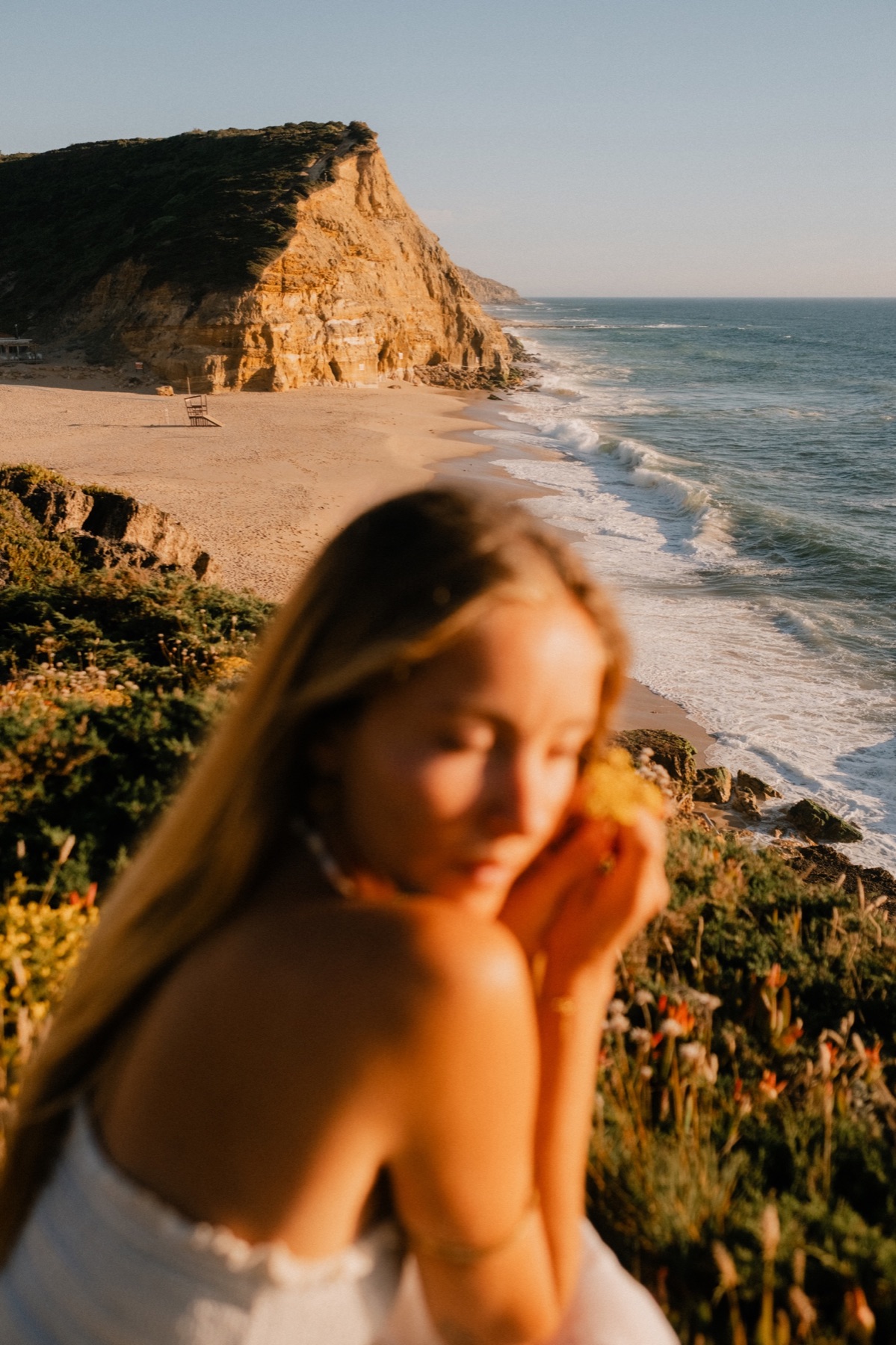 Soft focus portrait above São Julião beach