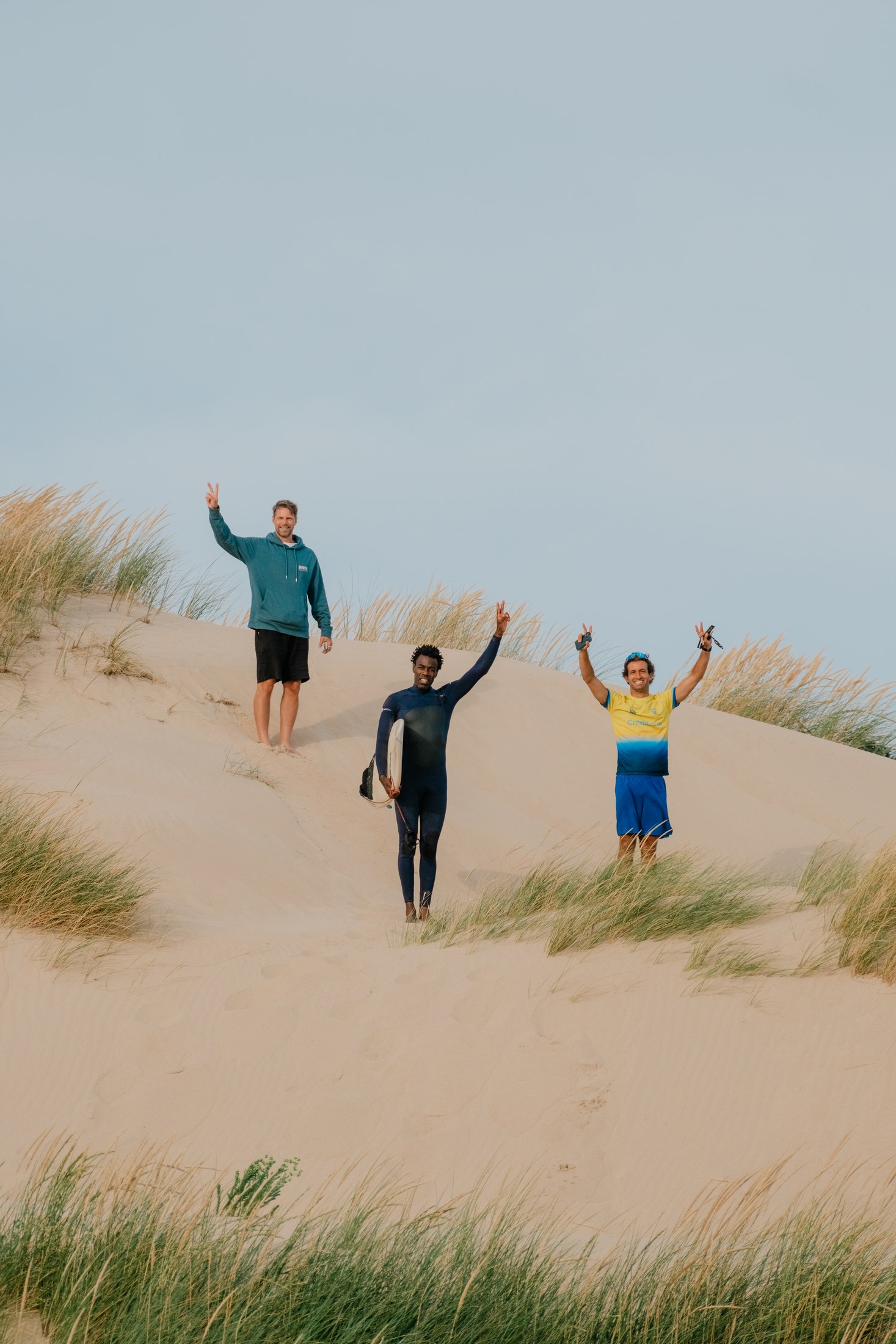 Two NoBox athletes arriving through the dunes
