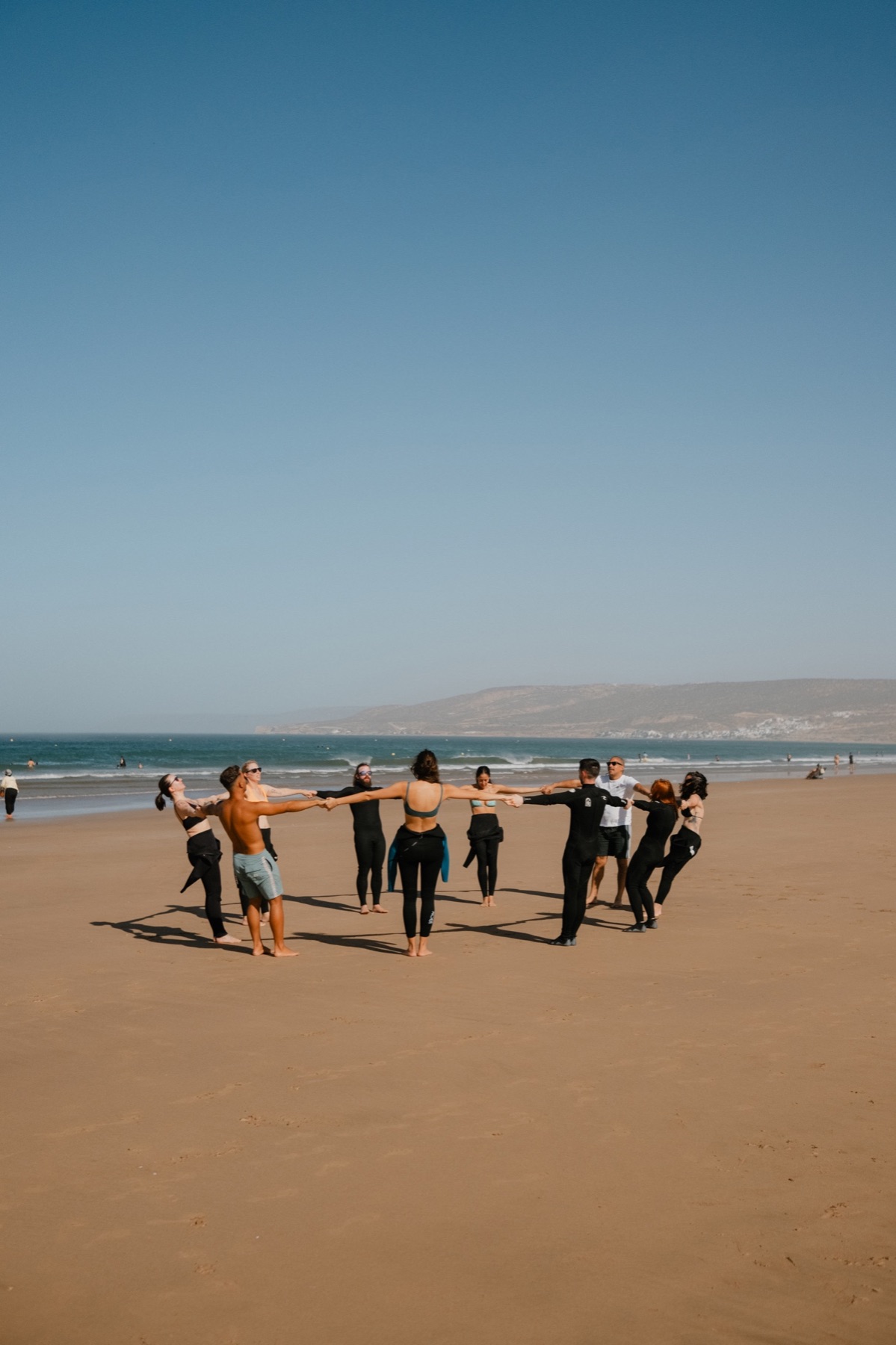 The group walking towards the water