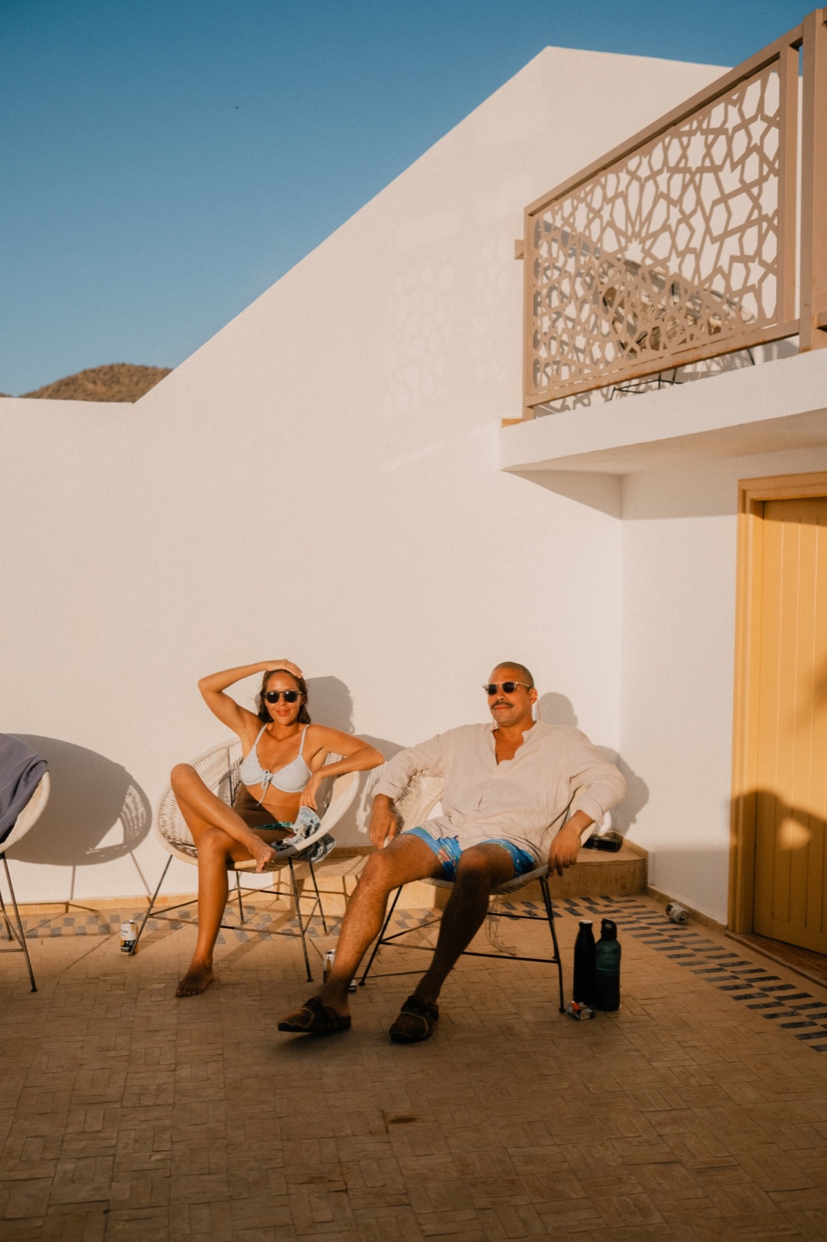 Guests sitting in the evening light
